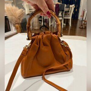 Chic Brown Mini Bag with Bamboo Handle and crossbody strap